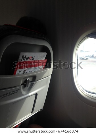 Airplane aircraft plane cabin seats from back stock, photo, photograph, picture, image