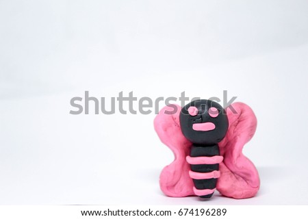 Cute Colorful Clay Butterfly On White background.