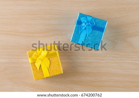  gift boxes on the wooden table background