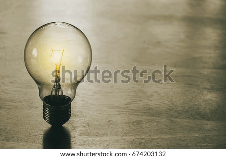 light bulb on wood background