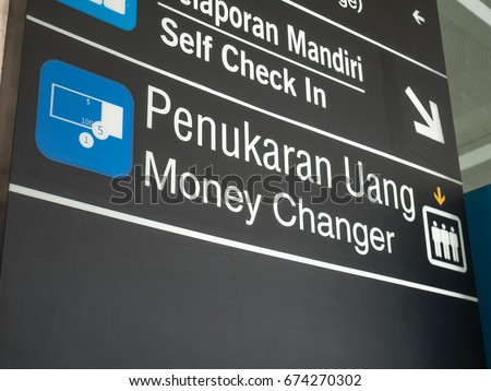Money Changer Airport Signage