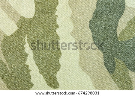 Military army camouflage fabric texture pattern background. Military army camouflage background. Military army camouflage texture for design work.