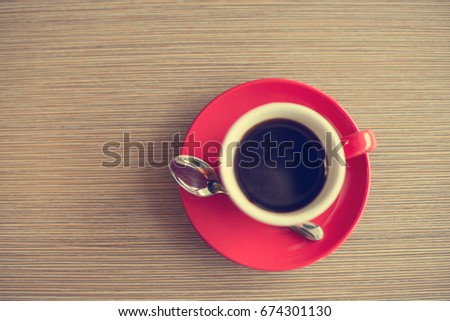 laptop and black coffe in vintage tone

