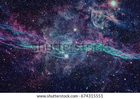 Colored nebula and open cluster of stars in the universe. Elements of this image furnished by NASA.