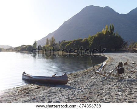 A nice canoe and lakes.