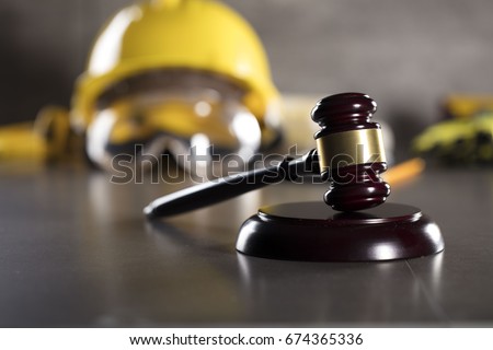 Construction law. Labor law concept. Royalty-Free Stock Photo #674365336
