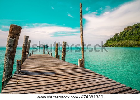 Long wooden bridge in beautiful tropical island beach - Koh Kood, Trat Thailand