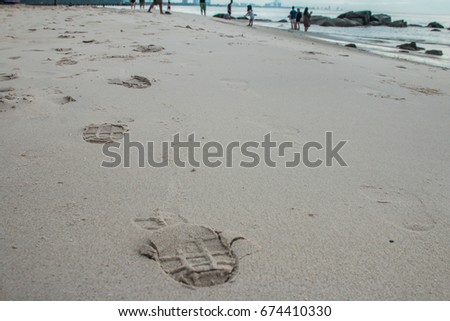 footprint on the beach at a morning