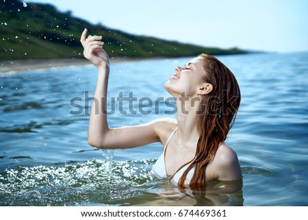 Woman at the sea, swimsuit                               