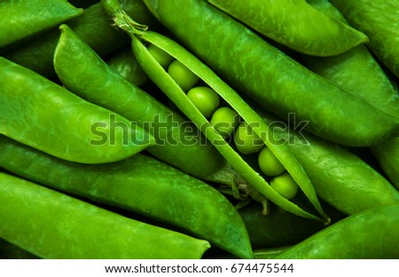 Grean peas as natural  food background Royalty-Free Stock Photo #674475544