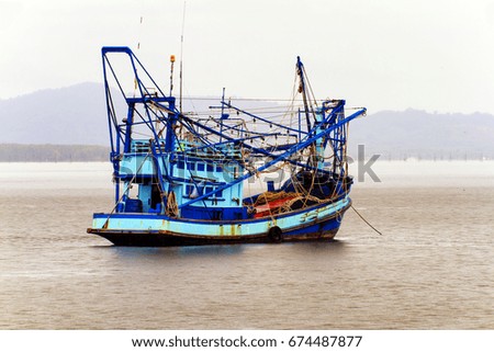 Squid fishing boats on the ocean view background at Thailand