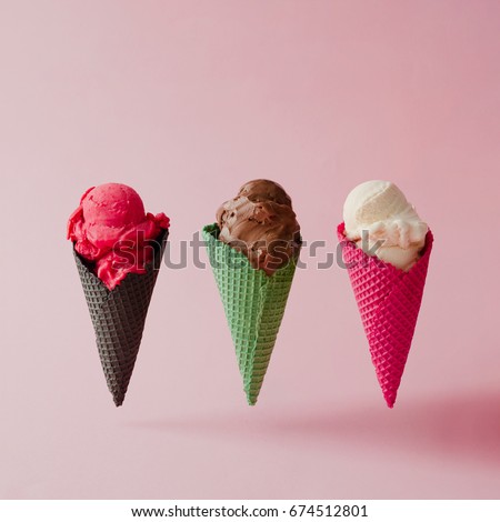 Various ice cream on pink pastel background. Summer creative concept.
