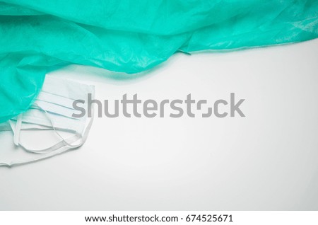 Surgeon mask on white background with copy space. Medical theme frame for concept or product placement.