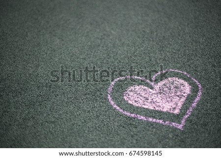 Painted heart on the asphalt