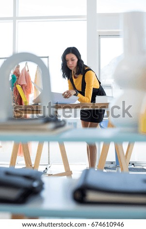 Fashion designer working in office