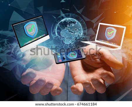 View of a Security shield symbol over a network connection of different devices - Technology concept