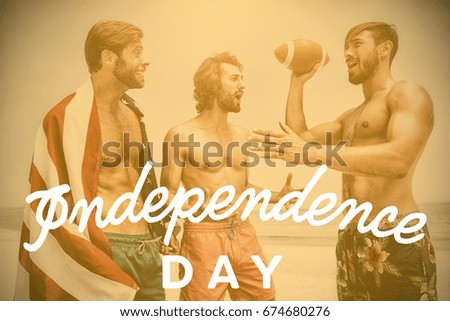 Independence day text against white background against smiling friends at the beach