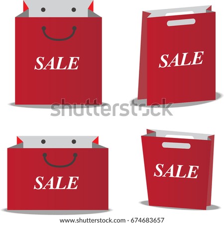 Red shopping bag with signage of sale