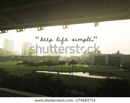 Inspirational quote on blurred background.