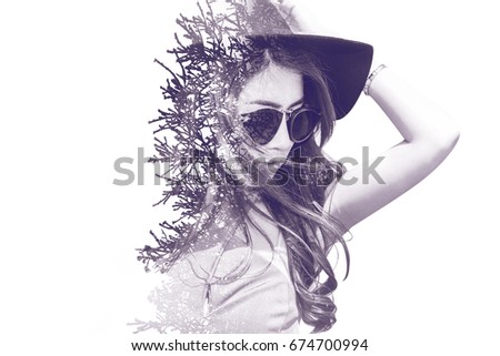 Double exposure portrait of beautiful girl combined with photograph of tree. retro tone