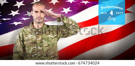 Portrait of confident soldier saluting against waving flag of america