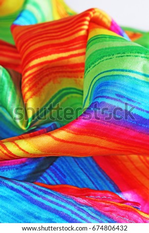 Silk dress material cloth texture pattern. 
tailoring stitching concept. Shiny beautiful fashion fabric. Shiny clothing material sample.Creased fabric.