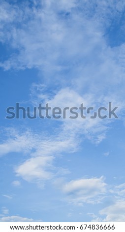 Vertical picture of blue sky and cloud in sunny day for background 