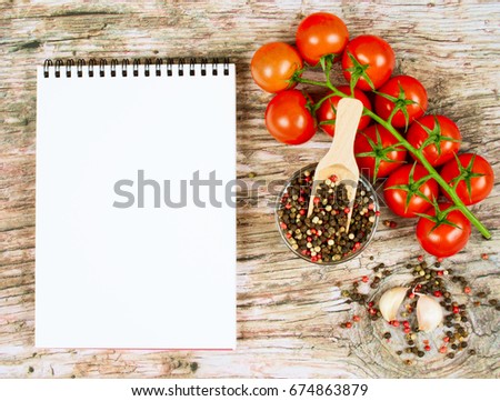 Horizontal food banner with cherry tomatoes and spices on wooden background with empty space for text.
