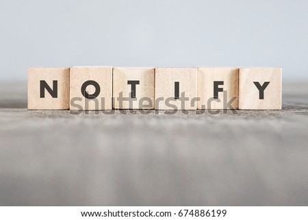 NOTIFY word made with building blocks  Royalty-Free Stock Photo #674886199