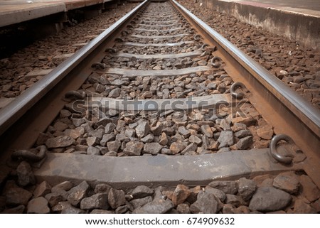 Close up railway tracks, shallow depth of field, Vintage style photo.