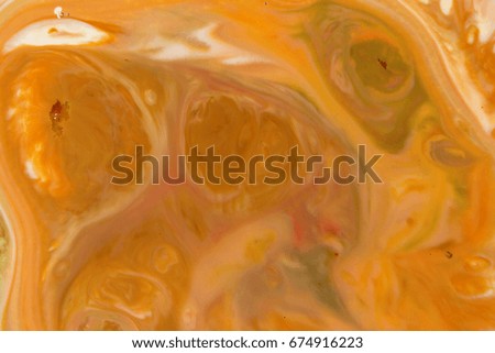 Closeup abstract color mixing of acrylic for use as background. Acrylic texture with marble pattern 