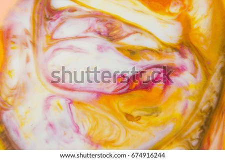 Closeup abstract color mixing of acrylic for use as background. Acrylic texture with marble pattern 