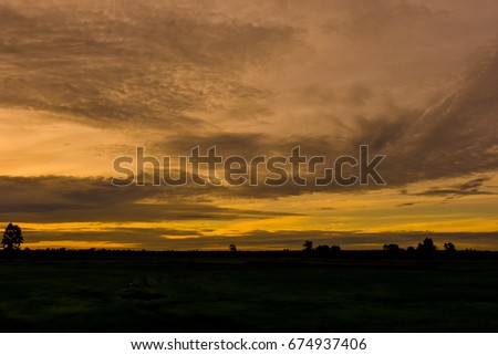 Bright big sun on the sky with yellow orange gradient colors in a calmly morning.-2