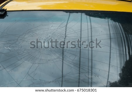 Car front window broken from accident parking and claim with insurance company.