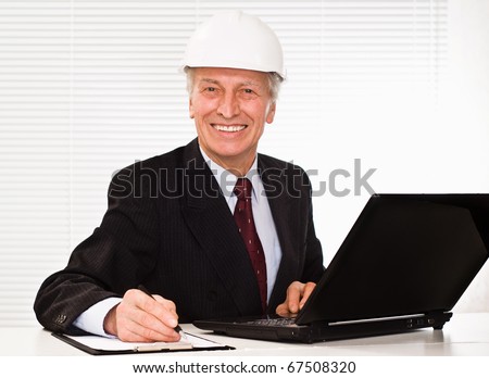 old builder  on a white background