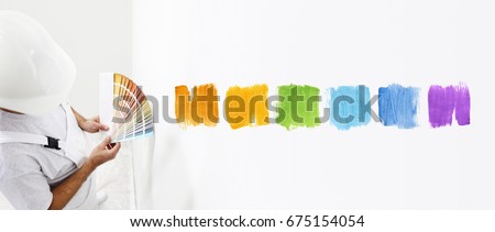 painter man with color swatches in your hand, Choice of colors concept, and color samples on white blank background