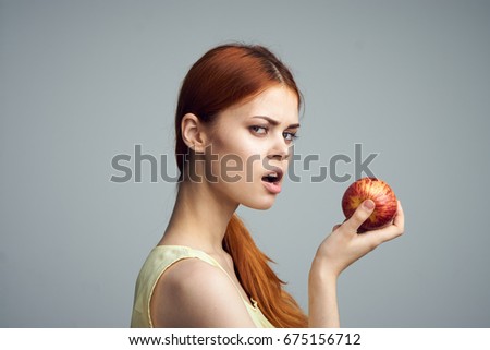 Woman with apple                               