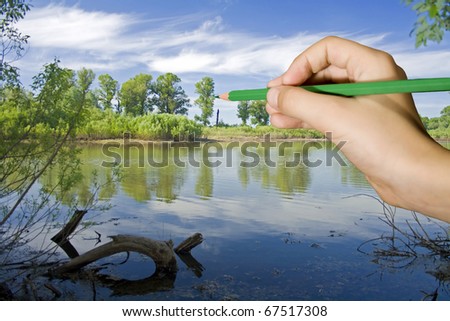 Young boy draw a summer landscape