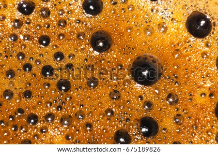 Close up of bubble black coffee in morning time