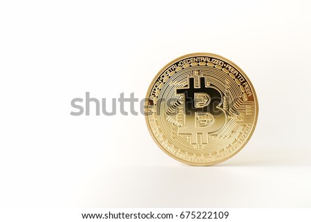 Golden bitcoin on white background with copyspace. Bit coin cryptocurrency banking money transfer business technology 