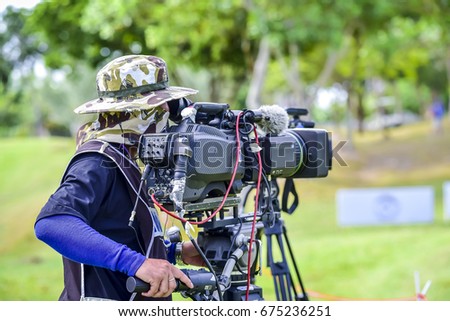 Photographer video recording for sport 