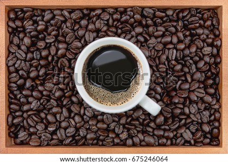 coffee concept flat lay top view Coffee cup and coffee beans on burlap Sack background.