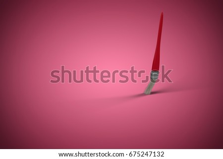 Graphic image of paintbrush against red and white background