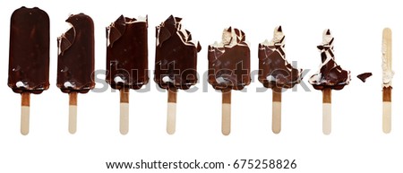 Progression of chocolate covered vanilla ice cream bars on a wooden stick with bites taken out. Isolated over a white background.  