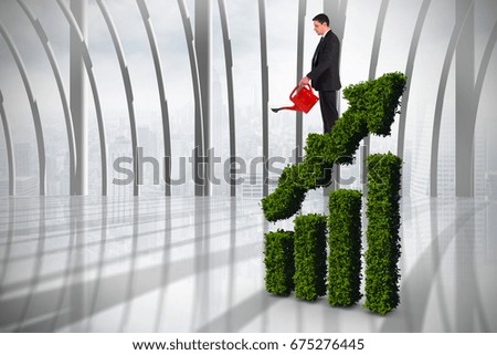 Businessman holding red watering can against white room with large window overlooking city