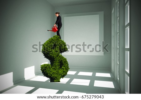 Businesswoman using red watering can against white room with square at wall