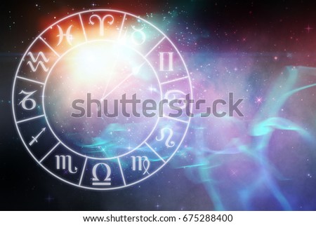 Digitally generated image of clock with various Zodiac signs against digitally generated image of colorful lights 