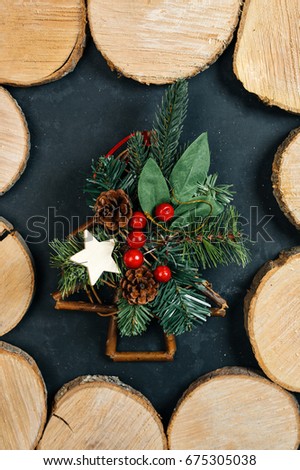Colourful traditional Christmas decoration  on grunge wood texture of old weathered boards with copyspace