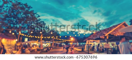 panorama abstract blur image of day festival in garden with bokeh for background usage . (vintage tone) Royalty-Free Stock Photo #675307696