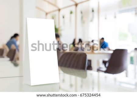 Mock up blank template menu frame in restaurant with blurred background, Clipping path included